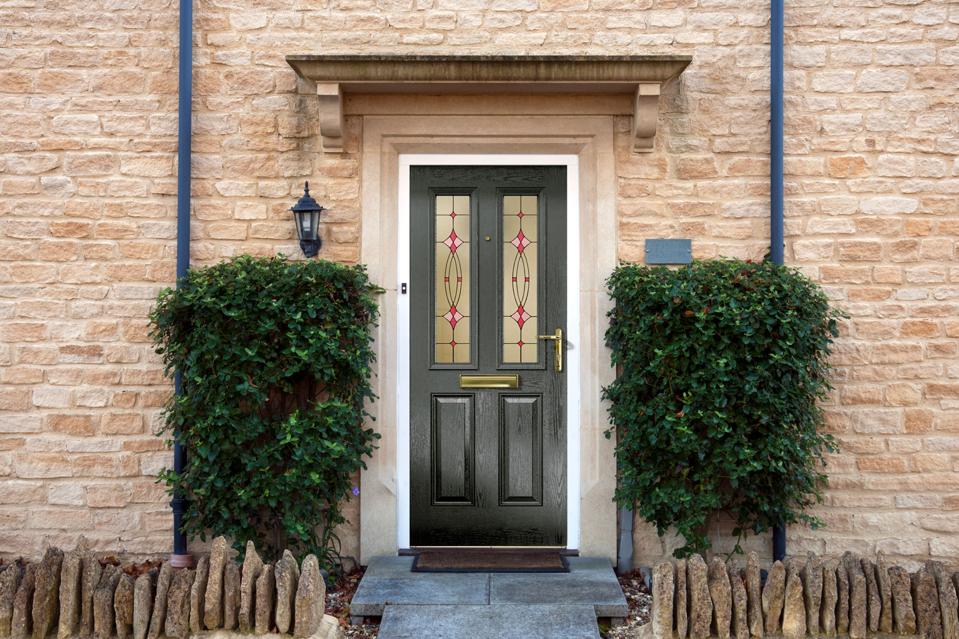 Black composite door with decorative glass and a white frame - Glazerite UPVC