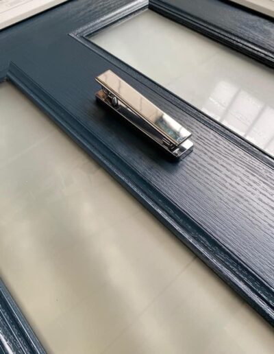 Close up of a grey composite door - Glazerite uPVC