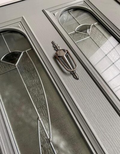 Close up of a grey composite door - Glazerite uPVC