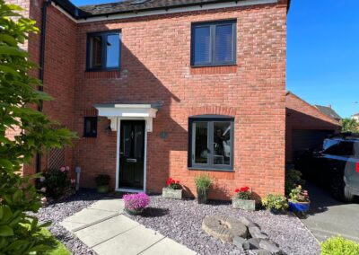 House with flush sash window replacement - Glazerite uPVC
