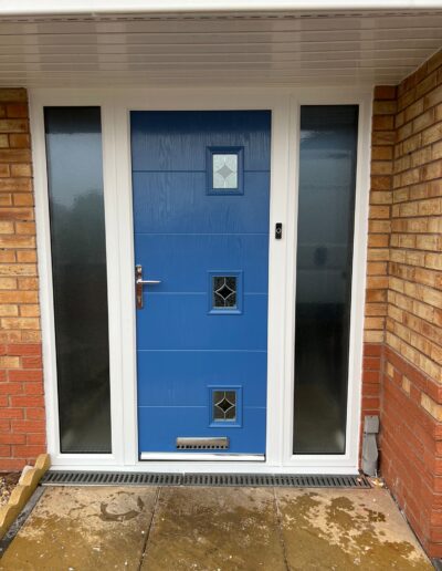 Blue composite door in a white frame - Glazerite uPVC