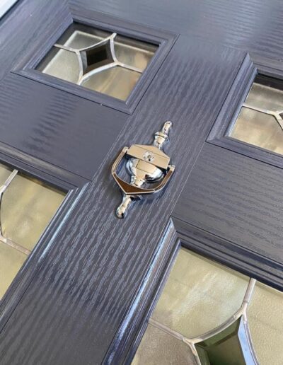 Close up of a grey composite door - Glazerite uPVC
