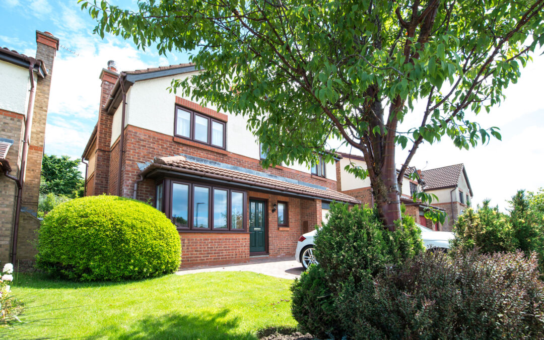 House with UPVC windows in rosewood - Glazerite UPVC