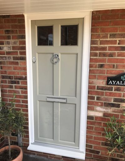 uPVC residential door with a bull ring knocker - Glazerite uPVC