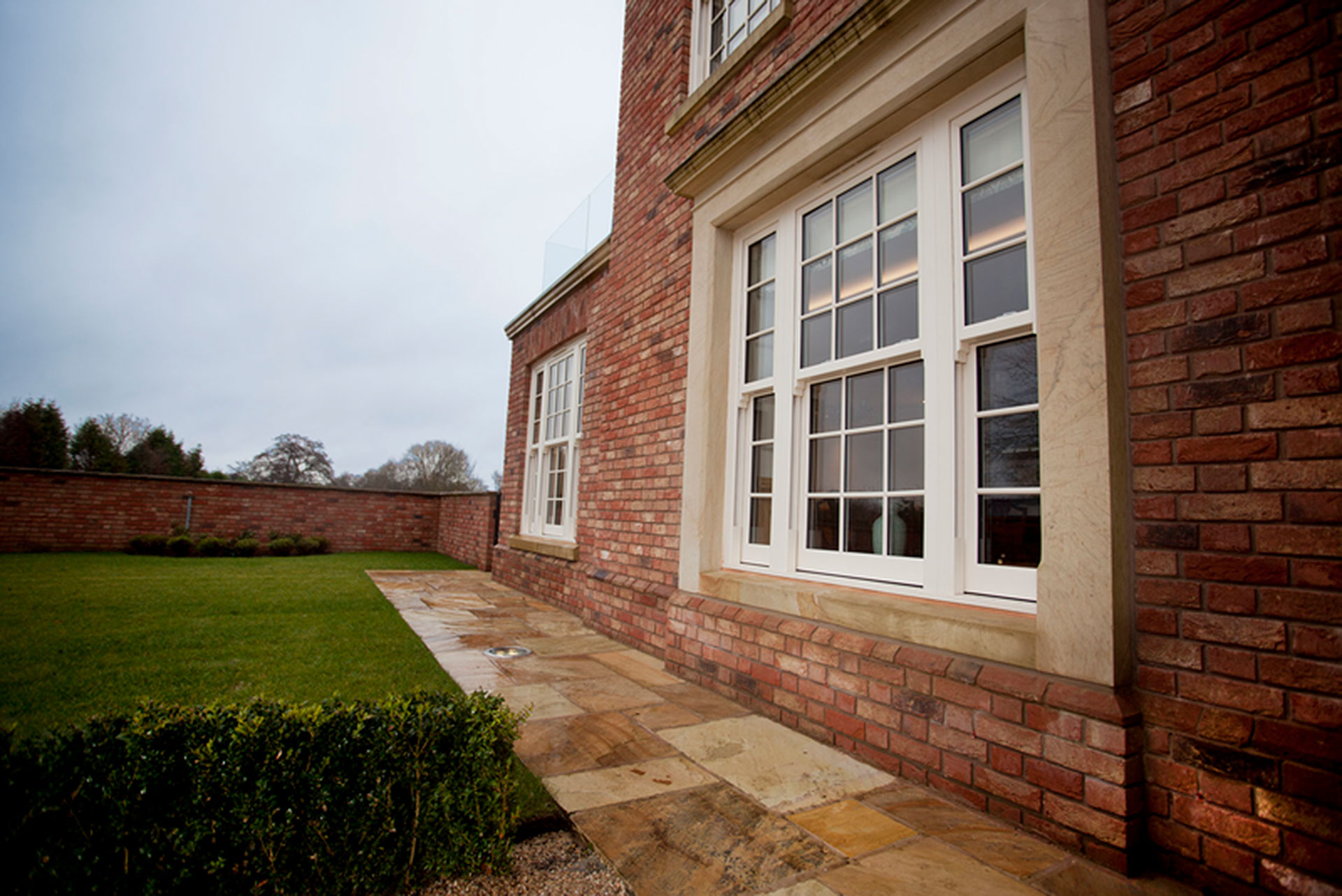 House with white sliding sash windows Birmingham - Glazerite UPVC